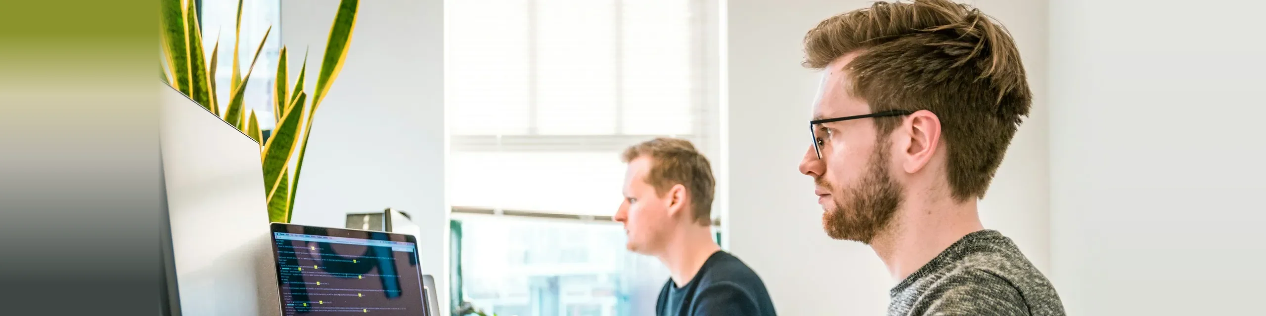 Support engineers working at their workstations